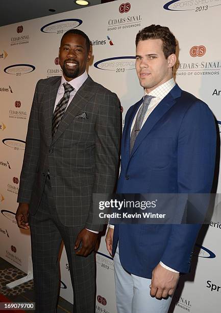 Pro basketball players DeAndre Jordan and Kris Humphries attend the 28th Anniversary Sports Spectacular Gala at the Hyatt Regency Century Plaza on...