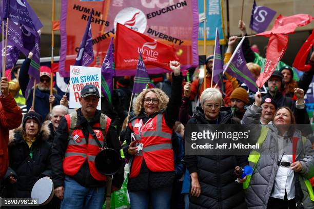 Lecturers and other staff attend a rally in Buchanan Street as strike action continues at five Scottish universities on September 19, 2023 in...