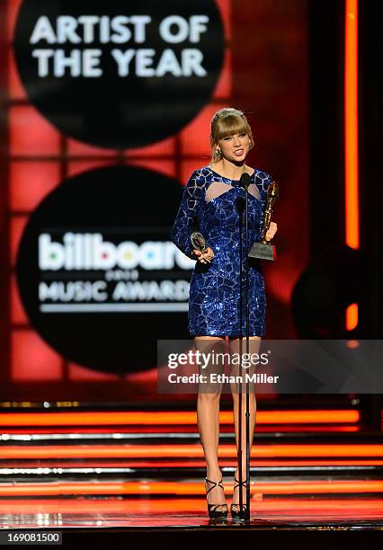 Singer Taylor Swift accepts the award for Artist of the Year onstage during the 2013 Billboard Music Awards at the MGM Grand Garden Arena on May 19,...