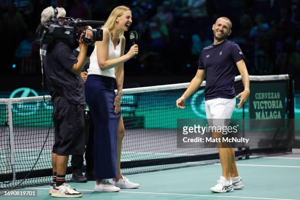 Daniel Evans of Team Great Britain is interviewed by Naomi Broady during the Davis Cup Finals Group Stage at AO Arena on September 17, 2023 in...