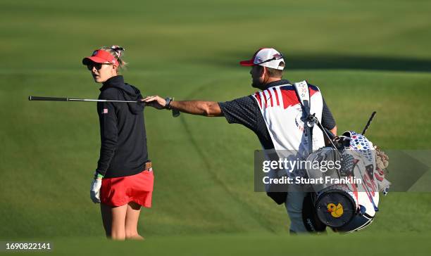 Nelly Korda of team USA and caddie walk during practice prior to the The Solheim Cup at Finca Cortesin Golf Club on September 19, 2023 in Casares,...