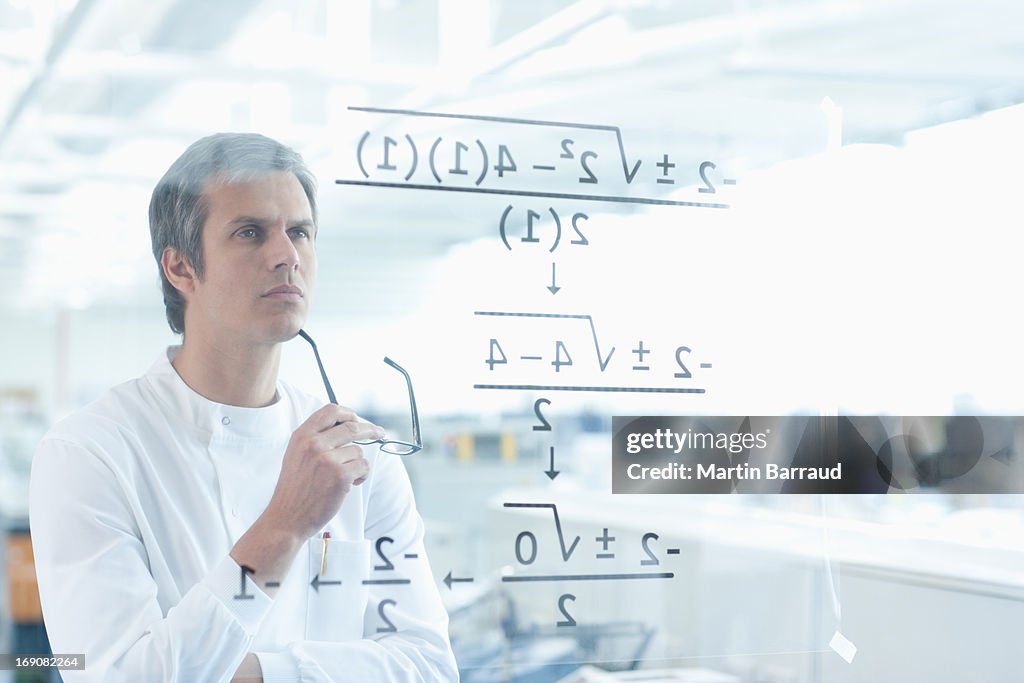 Scientist using touch screen in lab