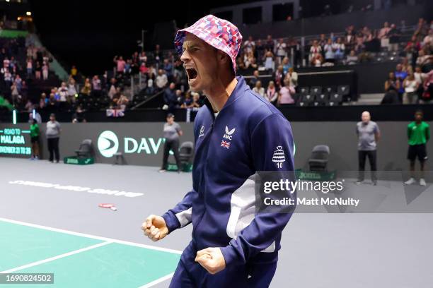 Andy Murray of Team Great Britain celebrates wearing a bucket hat during the Davis Cup Finals Group Stage at AO Arena on September 17, 2023 in...