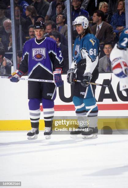 Al MacInnis of the Western Conference and the St. Louis Blues stands on the ice with Jaromir Jagr of the Eastern Conference and the Pittsburgh...