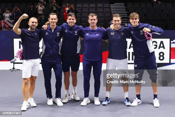 Daniel Evans, Andy Murray, Cameron Norrie, Leon Smith, Neal Skupski and Jack Draper of Team Great Britain pose for a photo after qualifying for the...