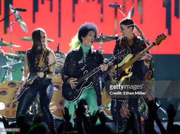 Guitarist Donna Grantis, recording artist Prince and bassist Ida Nielsen perform onstage during the 2013 Billboard Music Awards at the MGM Grand...