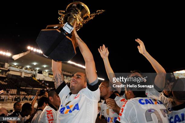 Players of Corinthians celebrate the title of the Paulista championship 2013 after the match between Santos and Corinthians as part of Paulista...