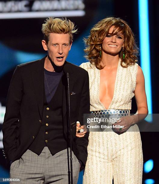 Presenters Gabriel Mann and Stana Katic speak onstage during the 2013 Billboard Music Awards at the MGM Grand Garden Arena on May 19, 2013 in Las...