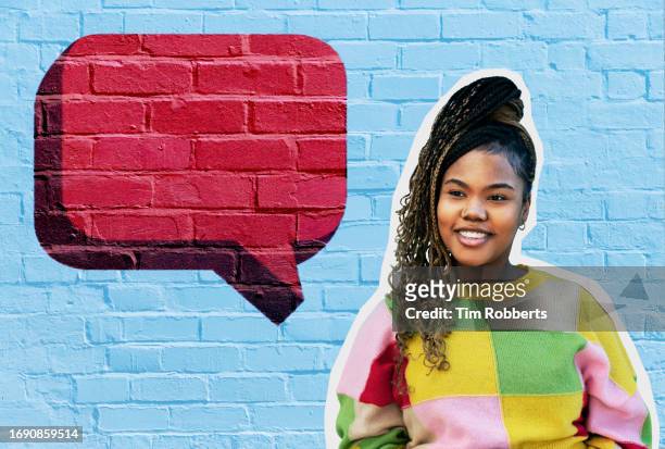 woman with graffiti speech bubble - multi colored stock pictures, royalty-free photos & images