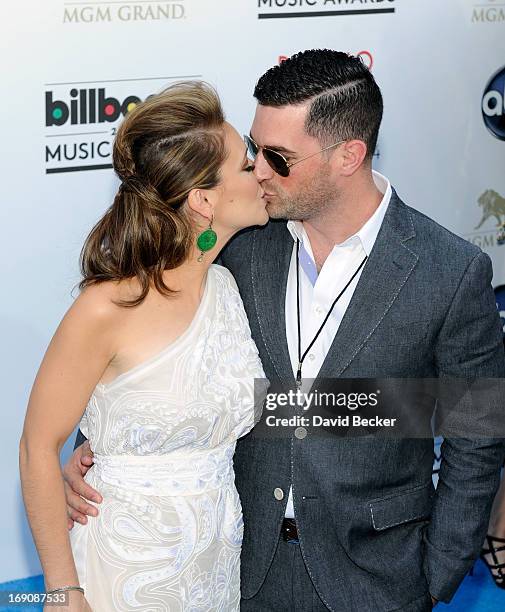 Actress Alyssa Milano and David Bugliari arrive at the 2013 Billboard Music Awards at the MGM Grand Garden Arena on May 19, 2013 in Las Vegas, Nevada.