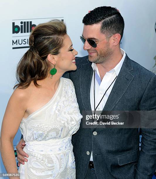 Actress Alyssa Milano and David Bugliari arrive at the 2013 Billboard Music Awards at the MGM Grand Garden Arena on May 19, 2013 in Las Vegas, Nevada.