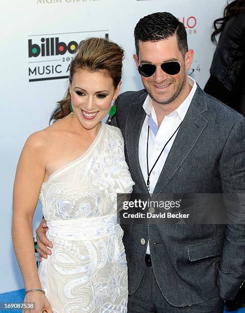 Actress Alyssa Milano and David Bugliari arrive at the 2013 Billboard Music Awards at the MGM Grand Garden Arena on May 19, 2013 in Las Vegas, Nevada.