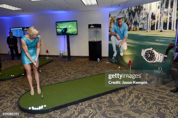 Olympian swimmer Jessica Hardy plays mini golf at the 28th Anniversary Sports Spectacular Gala at the Hyatt Regency Century Plaza on May 19, 2013 in...