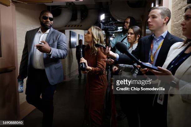 Rep. Byron Donalds , a member of the right-wing House Freedom Caucus, moves past reporters on his way to a House Republican caucus meeting at the...