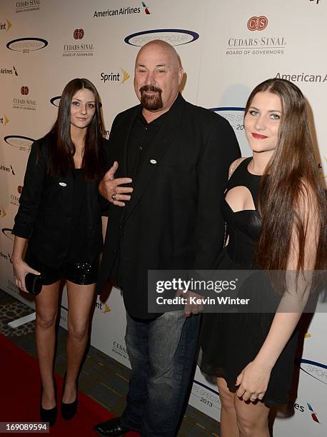 Former NFL player Jim Weatherley and his daughters attend the 28th Anniversary Sports Spectacular Gala at the Hyatt Regency Century Plaza on May 19,...