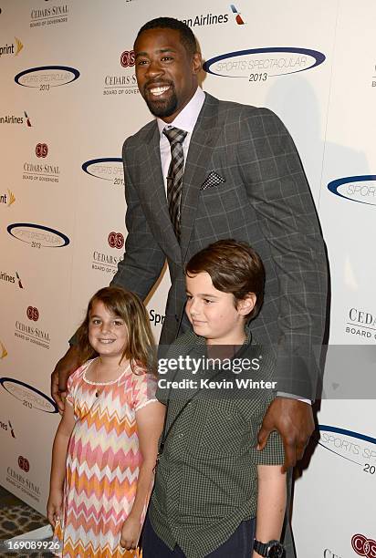 Pro basketball player DeAndre Jordan and the Wassmerman children attend the 28th Anniversary Sports Spectacular Gala at the Hyatt Regency Century...