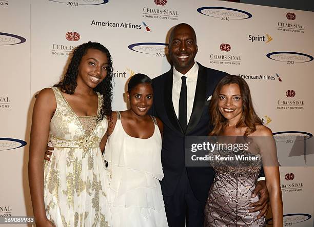 Tyla Salley, guest, former NBA player and radio host John Salley and Natasha Duffy attend the 28th Anniversary Sports Spectacular Gala at the Hyatt...