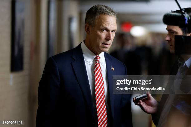 Rep. Scott Perry , chair of the right-wing House Freedom Caucus, talks to reporters on his way to a House Republican caucus meeting at the U.S....
