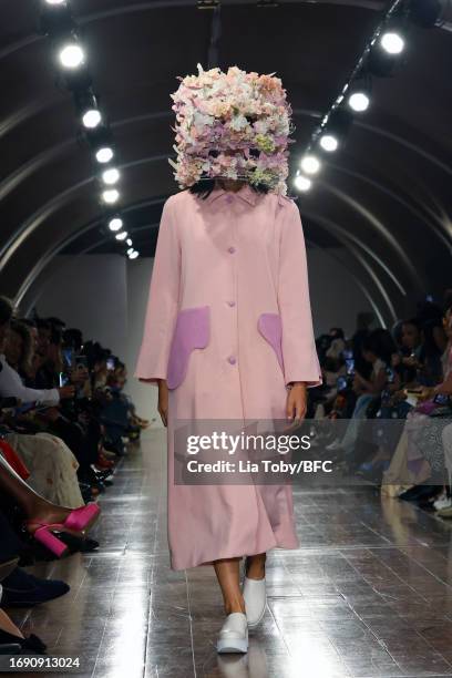 Model walks the runway at the Apujan show during London Fashion Week September 2023 at the Embankment Galleries, Somerset House on September 19, 2023...