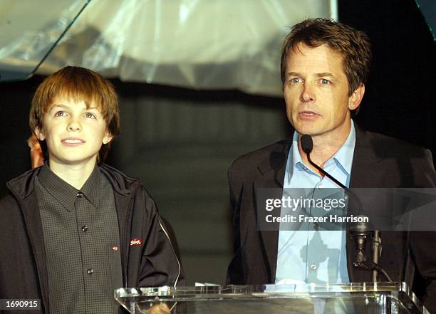 Actor Michael J Fox and son Sam on stage at the launch party of the 'Back to the Future' DVD release held at Universal Studios on December 16, 2002...