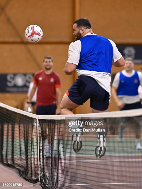 Bevan Rodd of England heads the ball whilst playing football tennis during a training session at Stade Ferdinand Petit on September 19, 2023 in Le...