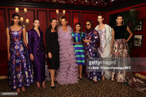 Managing Director of the British Fashion Council, Caroline Rush, Helena Christensen, Mila Al Zahrani, Arwa Alammari and models attend the BFC x AlUla...