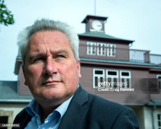 Dr Jens-Christian Wagner Foundation Director of Buchenwald and Mittelbau-Dora Memorial Foundation stands infront of the entrance to Buchenwald...
