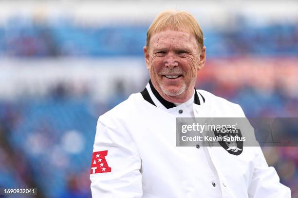 Owner Mark Davis of the Las Vegas Raiders smiles on the sidelines prior to an NFL football game against the Buffalo Bills at Highmark Stadium on...