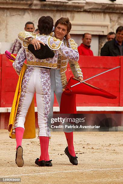 French bullfighters Juan Leal and Sebastien Castella embrace in the Nimes Arena during the 61st annual Pentecost Feria de Feira on May 19, 2013 in...