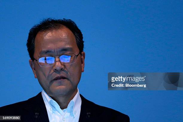 Takashi Tanaka, president of KDDI Corp., attends the unveiling of the company's new products and services in Tokyo, Japan, on Monday, May 20, 2013....
