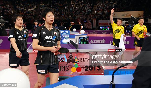 Seiya Kishikawa and Jun Mizutani of Japan show their dejections after the Men's Doubles Semi Final match against Hao Shuai and Ma Lin of China during...