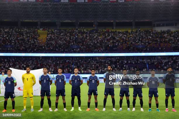 Players of India line up for team photo during the 19th Asian Game Men Group A match between China and India at Huanglong Sports Centre Stadium on...