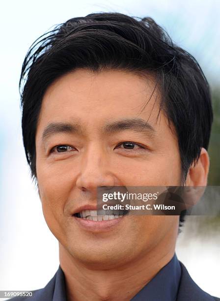 Actor Takao Osawa attends the photocall for 'Wara No Tate' at The 66th Annual Cannes Film Festival at Palais des Festivals on May 20, 2013 in Cannes,...