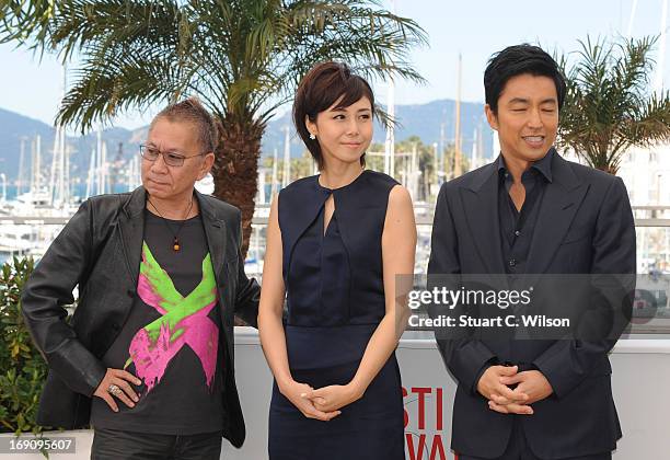 Director Takashi Miike, actress Nanako Matsushima and actor Takao Osawa attends the photocall for 'Wara No Tate' at The 66th Annual Cannes Film...