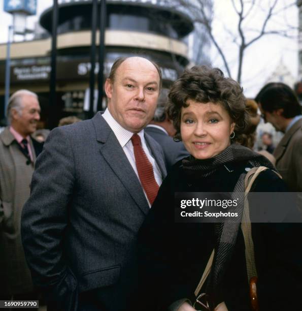 Portrait of married English actors Timothy West and Prunella Scales as they attend an unspecified event, London, England, March 20, 1986.