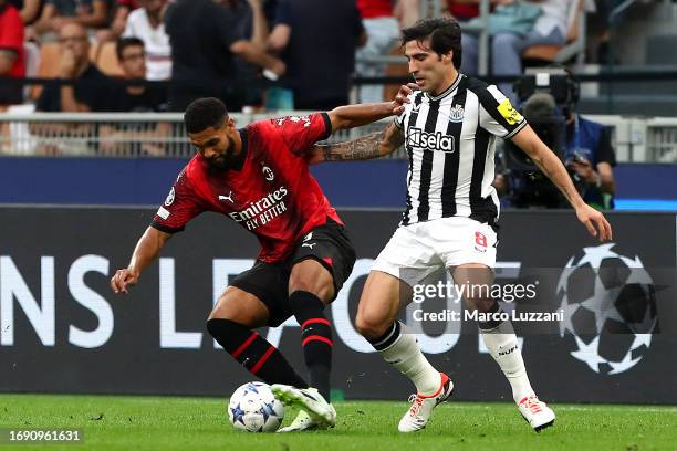 Ruben Loftus-Cheek of AC Milan challenges for the ball with Sandro Tonali of Newcastle United during the UEFA Champions League Group F match between...