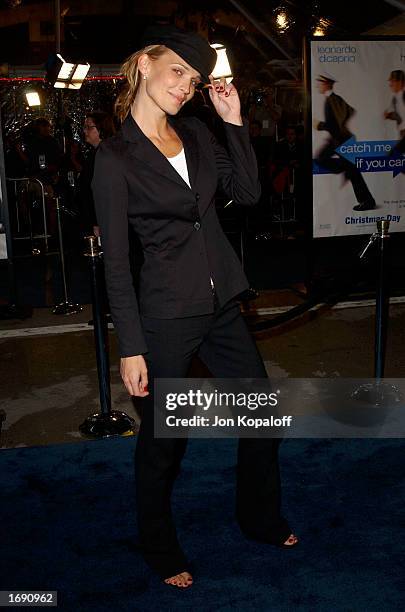 Actress Molly Sims attends the premiere of "Catch Me If You Can" at the Mann Village Theatre on December 16, 2002 in Westwood, California.