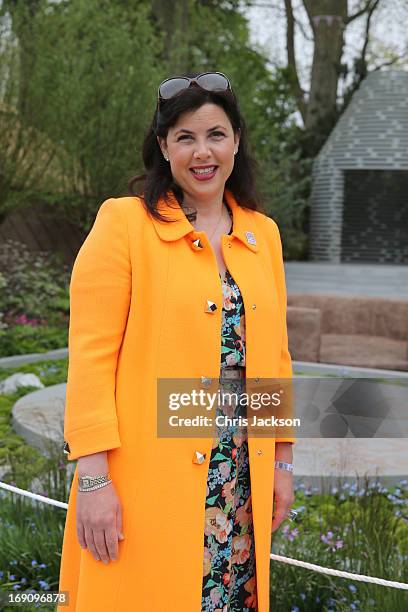 Kirstie Allsopp poses in the B&Q Sentebale 'Forget-Me-Not' Garden at the Chelsea Flowert Show at the Royal Hospital Chelsea on May 20, 2013 in...