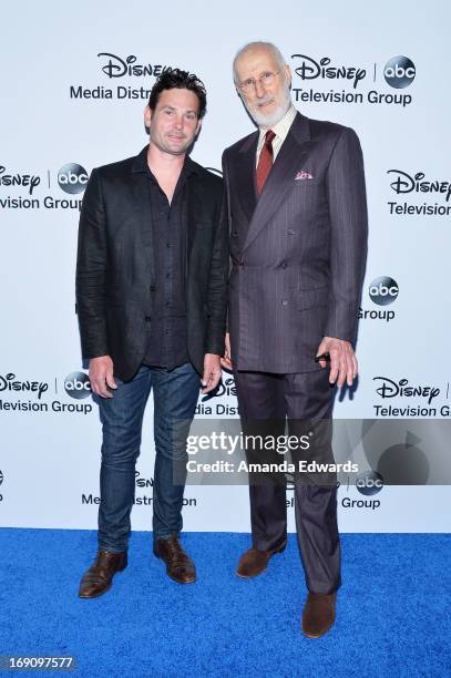 Actors Henry Thomas and James Cromwell arrive at the Disney Media Networks International Upfronts at Walt Disney Studios on May 19, 2013 in Burbank,...