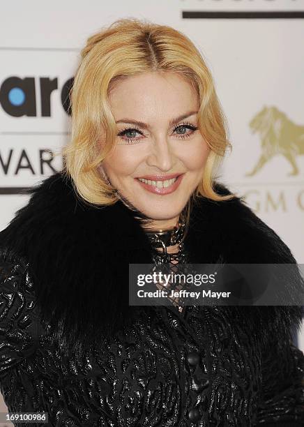 Singer Madonna poses in the press room at the 2013 Billboard Music Awards at MGM Grand Garden Arena on May 19, 2013 in Las Vegas, Nevada.