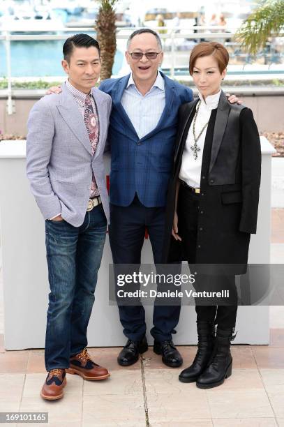 Andy Lau, Johnnie To and Sammi Cheng attend the photocall for 'Blind Detective' during the 66th Annual Cannes Film Festival at Palais des Festivals...