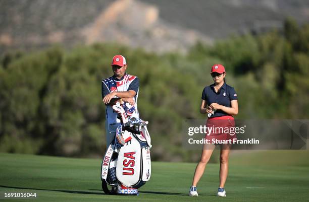 Rose Zhang of team USA and caddie during practice prior to the The Solheim Cup at Finca Cortesin Golf Club on September 19, 2023 in Casares, Spain.
