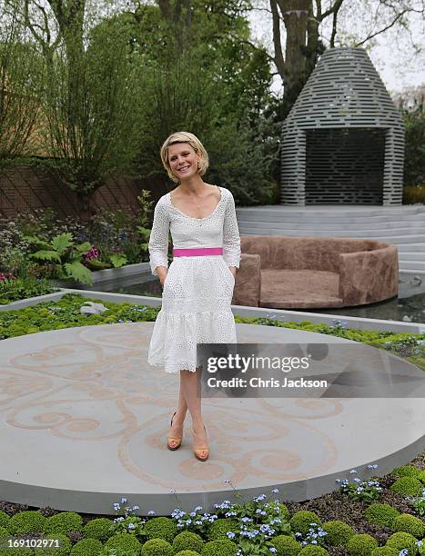 Actress Emilia Fox poses in the B&Q Sentebale 'Forget-Me-Not' Garden at the Chelsea Flower Show at Royal Hospital Chelsea on May 20, 2013 in London,...