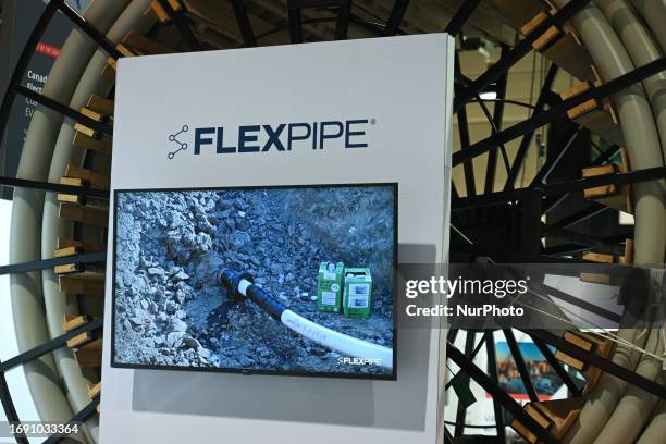 September 20, 2023 : FlexPipe company stand displaying pictures seen on the fourth day of the 24th World Petroleum Congress at the BMO Center,...