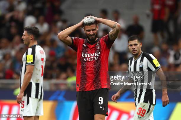 Olivier Giroud of AC Milan reacts after a missed chance during the UEFA Champions League Group F match between AC Milan and Newcastle United FC at...
