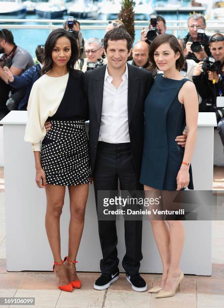 Actress Zoe Saldana, director and actor Guillaume Canet and actress Marion Cotillard attend the photocall for 'Blood Ties' during the 66th Annual...