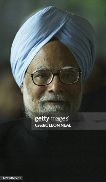 Indian Prime Minister Manmohan Singh arrives at Cambridge University in Cambidgeshire, in south-east England, 11 October 2006, as he prepares to...