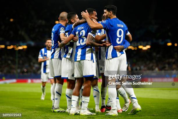 Galeno of FC Porto celebrates with teammates after scoring the team's first goal during the UEFA Champions League Group H match between FC Shakhtar...