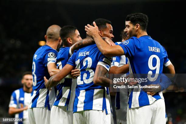 Galeno of FC Porto celebrates with teammates after scoring the team's first goal during the UEFA Champions League Group H match between FC Shakhtar...