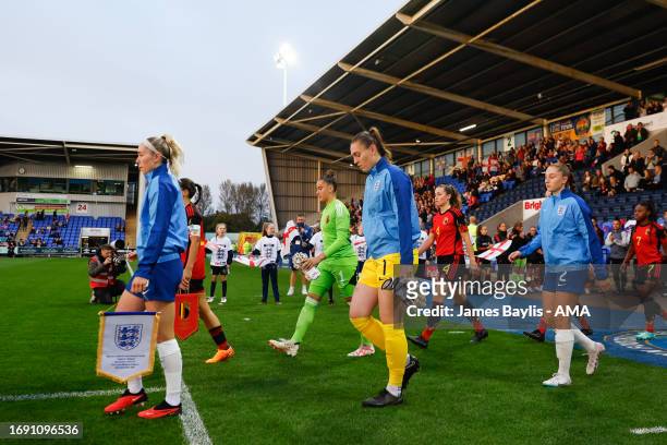 England captain Missy Bo Kearns leads out the England Women U23 team before the Women's International Friendly between England Women U23 and Belgium...